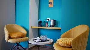 Příslušenství pro přípravu čaje a kávy v ubytování Terminal 1 Guest House