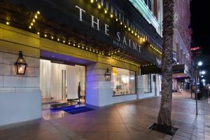 a store front of a building with lights on it at The Saint Hotel, New Orleans, French Quarter, Autograph Collection in New Orleans