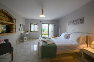 Letto o letti in una camera di Κοχύλι