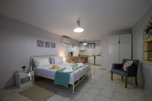 Letto o letti in una camera di Κοχύλι