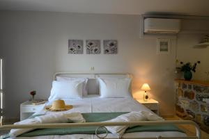Letto o letti in una camera di Κοχύλι