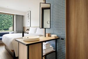 Postel nebo postele na pokoji v ubytování Fairfield by Marriott Tochigi Motegi