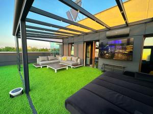 Posedenie v ubytovaní LUXURY APARTAMENT Z DUŻYM TARASEM - Park City Poznań