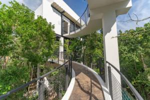 Exclusive Villa "Town House" Luxury Amenities in Tulum tesisinde bir balkon veya teras