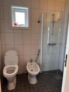 Koupelna v ubytování Midnattsol rom og hytter