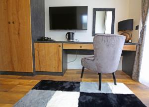 TV a/nebo společenská místnost v ubytování Apartmani Krka Rooms