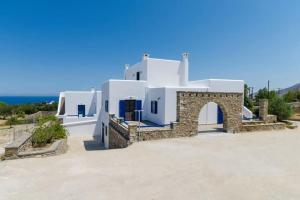 a villa with a view of the ocean at Dream Inn Paros, private pool in Sarakíniko