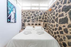 Ένα ή περισσότερα κρεβάτια σε δωμάτιο στο Villa Olive Tree +39 φωτογραφίες