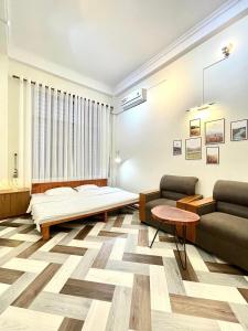 Posezení v ubytování BÊ TÔNG RESIDENCES HOMESTAY