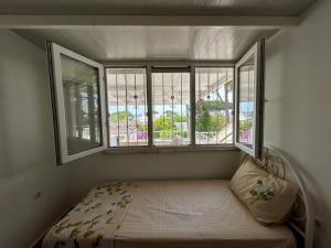 Ένα ή περισσότερα κρεβάτια σε δωμάτιο στο Somos Flats - Mavişehir