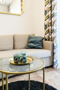 a coffee table in a living room with a couch at Holiday Home Josipa in Supetar