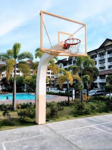 a basketball hoop in the middle of a parking lot at Condo for rent in Davao City in Davao City