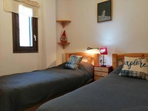 Postel nebo postele na pokoji v ubytování Amplio apartamento con jardín y piscina Herbasabina 5