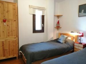 Postel nebo postele na pokoji v ubytování Amplio apartamento con jardín y piscina Herbasabina 5