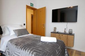 Postel nebo postele na pokoji v ubytování Apartmani Krka Rooms