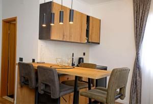 Kuchyň nebo kuchyňský kout v ubytování Apartmani Krka Rooms