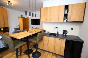 Kuchyň nebo kuchyňský kout v ubytování Apartmani Krka Rooms