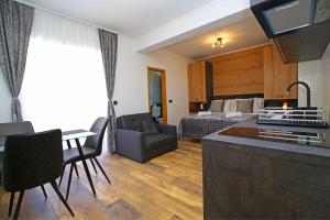 Kuchyň nebo kuchyňský kout v ubytování Apartmani Krka Rooms