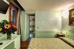 Cama o camas de una habitación en Palazzo La Scala