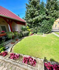 Vonkajšia záhrada v ubytovaní Do-Ti Apartmanház Balatonlelle