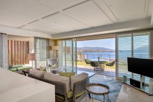 a living room with a view of the ocean at Caresse, a Luxury Collection Resort & Spa, Bodrum in Bitez