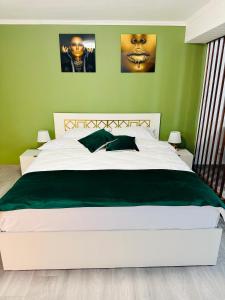 Cama o camas de una habitación en Luxor Apartament Sibiu