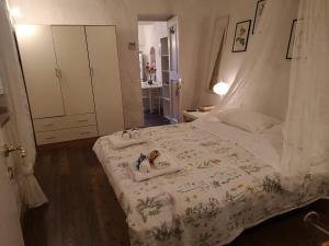 Postel nebo postele na pokoji v ubytování Antiche Mura