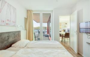 Ein Bett oder Betten in einem Zimmer der Unterkunft Passatvilla - Apartment 5
