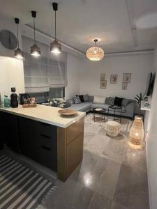 Dapur atau dapur kecil di Appartement avec piscine et 10 min plage