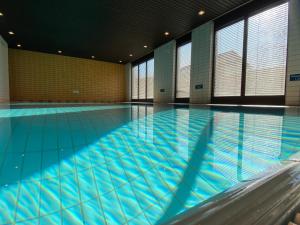 Πισίνα στο ή κοντά στο Ferienwohnung Spitzstein - Alpenmagie Suites +12 φωτογραφίες
