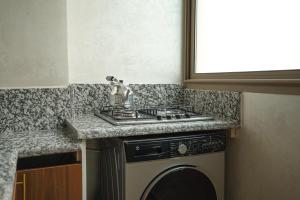 Η κουζίνα ή μικρή κουζίνα στο New Appartment