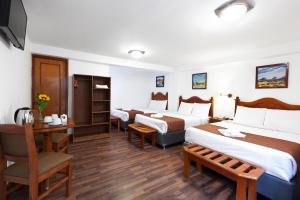 Postel nebo postele na pokoji v ubytování Hotel Amerinka