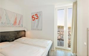 Ein Bett oder Betten in einem Zimmer der Unterkunft Passatvilla - Apartment 5