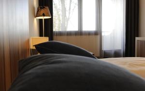 Postel nebo postele na pokoji v ubytování Seewirt & Haus Attila