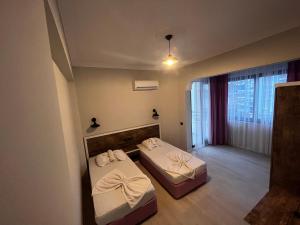 Postel nebo postele na pokoji v ubytování Best Alanya Hotel
