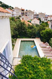 Bazén v ubytovaní Apartment Marghareta alebo v jeho blízkosti