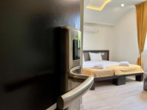 Krevet ili kreveti u jedinici u okviru objekta Side One Design Hotel Garni