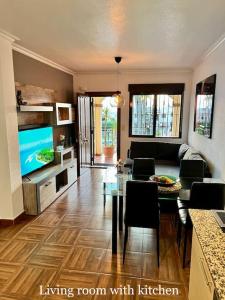 Telewizja i/lub zestaw kina domowego w obiekcie Casa de Holm