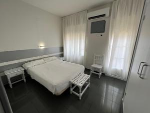 Postel nebo postele na pokoji v ubytování Hostal Venta Del Sol
