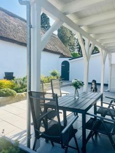 Αίθριο ή υπαίθριος χώρος στο Naturidyll Mariendorf - Ferienwohnung Zickersche Berge