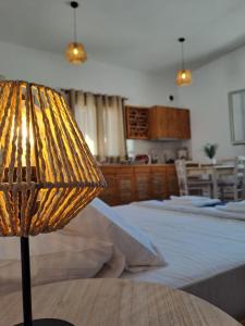 Postel nebo postele na pokoji v ubytování Poudas House