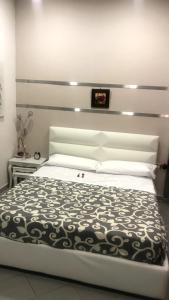 Ein Bett oder Betten in einem Zimmer der Unterkunft La Massaria