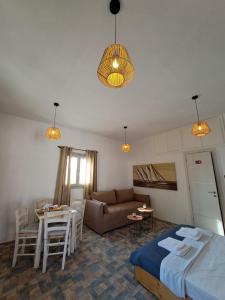 Postel nebo postele na pokoji v ubytování Poudas House