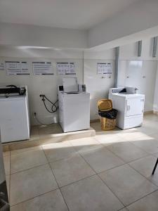 a room with two machines on the floor in a room at LaMari in Buenos Aires