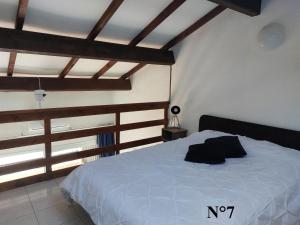Postel nebo postele na pokoji v ubytování Vista Mare Ghisonaccia - Ange Nico -