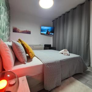 Ein Bett oder Betten in einem Zimmer der Unterkunft Apartamento Playa Chica