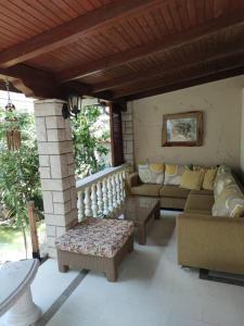 a living room with a couch and a table at Old House - Ferienhaus in Selce +19 photos