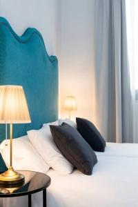 Postel nebo postele na pokoji v ubytování San Buenaventura Apartment 14