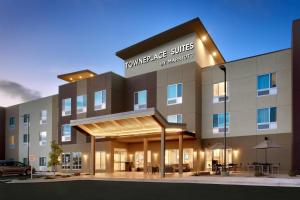 a rendering of the front of a hotel at TownePlace Suites by Marriott Clovis in Clovis