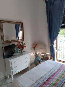 Posteľ alebo postele v izbe v ubytovaní Apartamento “El Burladero” + 16 fotografií
